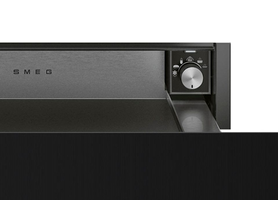 Closeup of a warming drawer's knob with key functions