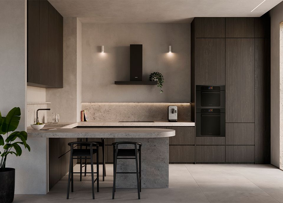 Modern kitchen with dark wood cabinets, a concrete island, integrated appliances, and minimalist lighting.