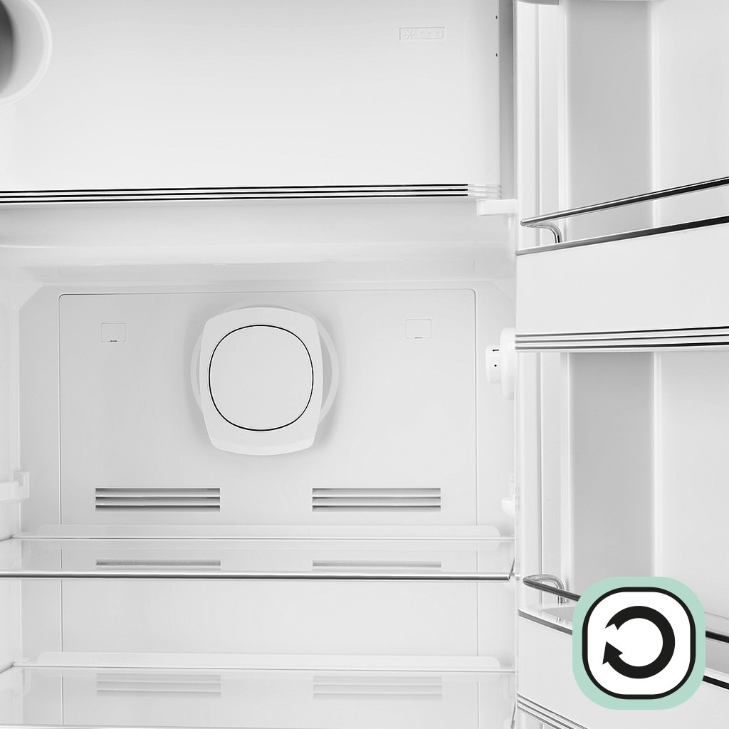 Interior of a refrigerator with circular air circulation system and vents ensuring uniform cooling across shelves